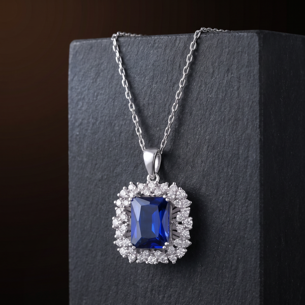 The Kensington Necklace draped over dark basalt stone